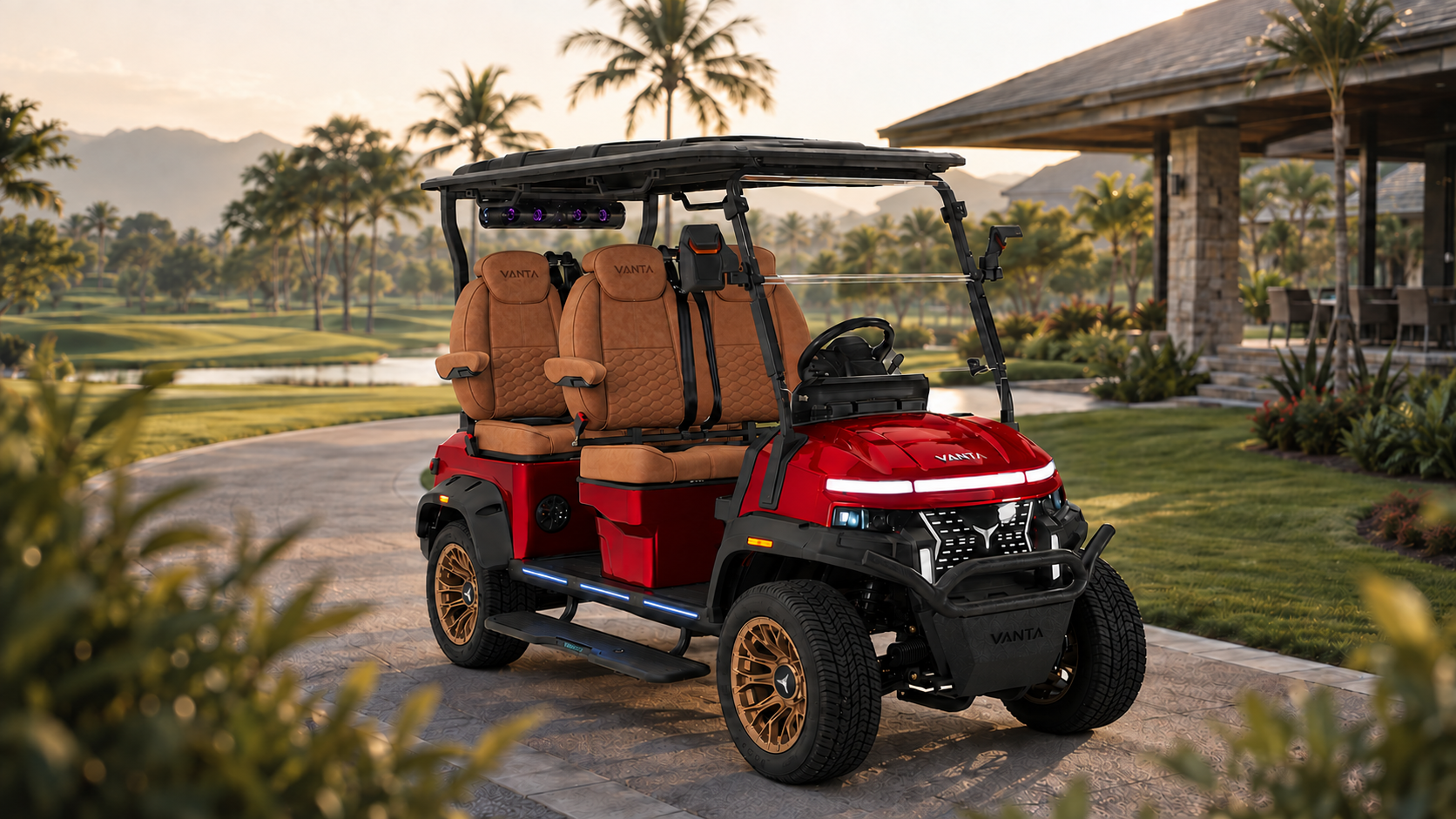 Vanta Kirin K4 four-seat electric golf cart in burgundy red with tan leather seats at a tropical resort