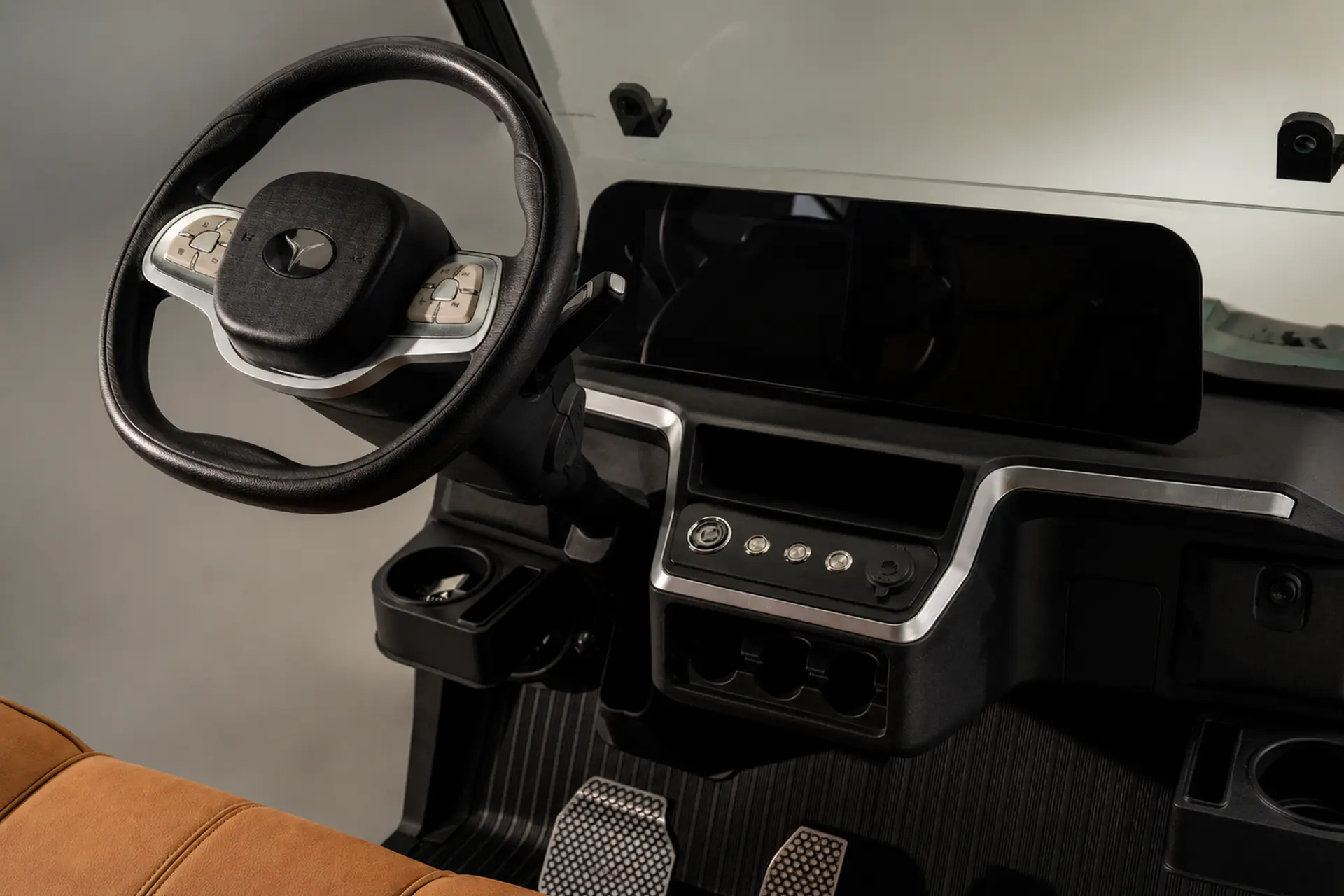 Vanta dashboard with steering wheel, digital display, and control console